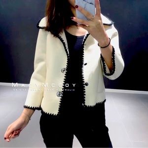 Double wear wool and leather jacket from Macy McCoy